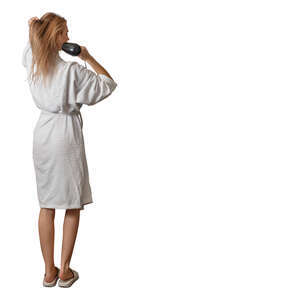 cut out woman in a bathrobe drying her hair