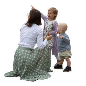 woman with two kids looking at smth