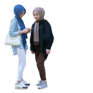 two cut out muslim girls standing