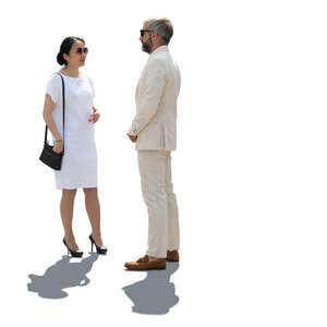 backlit man and woman in elegant white summer outfits standing