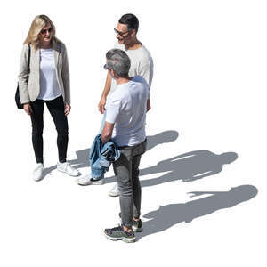 three people standing together seen from above