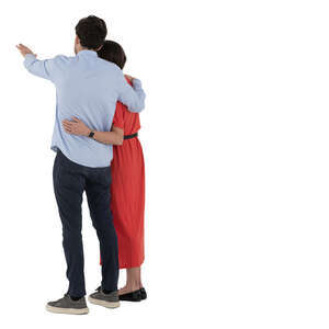 couple standing and pointing at smth
