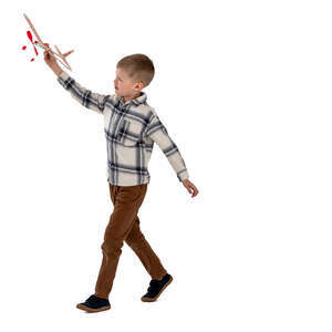 cut out little boy playing with a toy plane