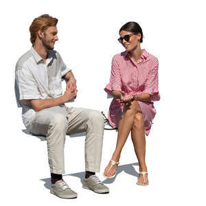 man and woman sitting and talking