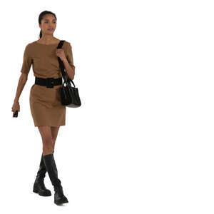 woman in a brown mini dress walking