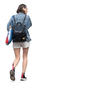 young woman in shorts walking