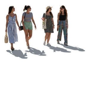 four backlit women walking