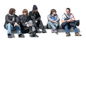 group of young people sitting on the stairs outside