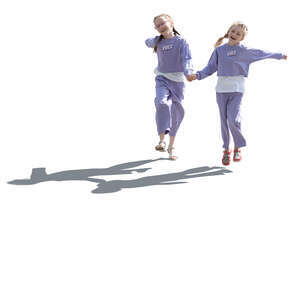 two backlit girls walking playfully