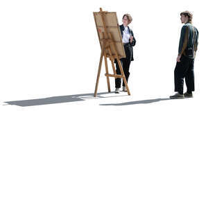 cut out backlit woman painting outside