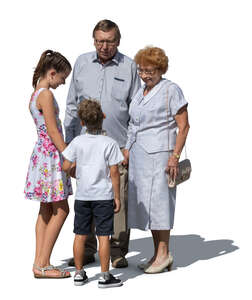 grandparents with grandchildren standing