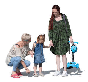 woman with her daughter and mother standing
