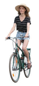 cut out woman with a hat riding a bicycle