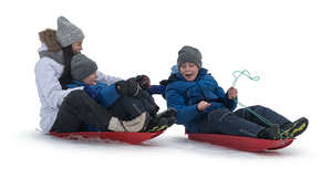 woman with two kids sleighing