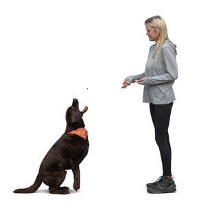 cut out woman giving treats to her dog