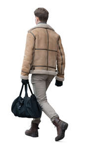 man in a leather jacket and carrying a sports bag walking
