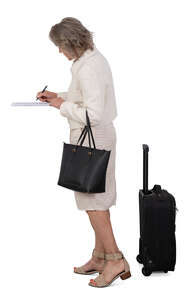 woman checking in at the hotel reception