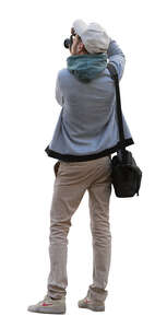 photographer taking pictures in the street