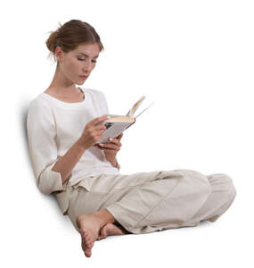 woman sitting on the sofa and reading a book