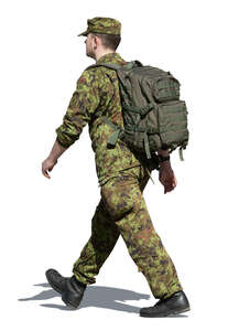 soldier with a backpack walking