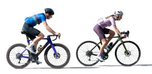 two sporty bikers riding bicycles
