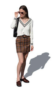 top view of a young woman with sunglasses standing