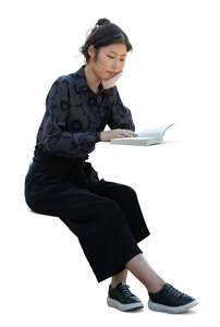 cut out korean woman sitting and reading a book