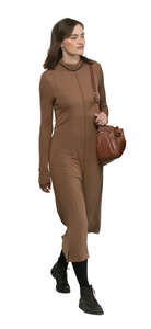 cut out woman in a brown dress walking