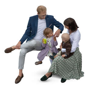 top view of a family with small kids sitting