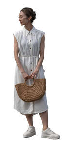 japanese woman in a white dress standing