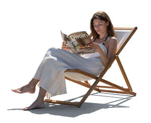 woman relaxing in the garden chair and reading