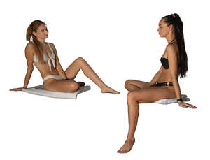two cut out women in bathing suits sitting in a spa