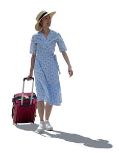 cut out backlit asian woman with a suitcase travelling