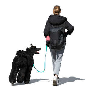 cut out woman with a black hairy dog walking