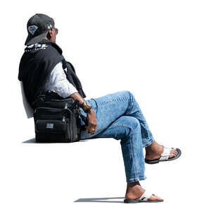 cut out black man sitting on the bench