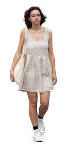 cut out woman in a mini summer dress walking