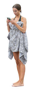 cut out woman standing with a towel after swimming