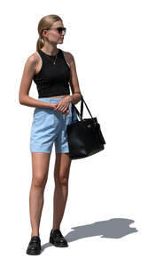 cut out woman in blue shorts standing