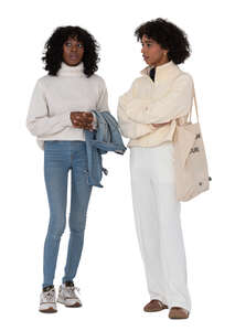 two cut out black women standing and talking