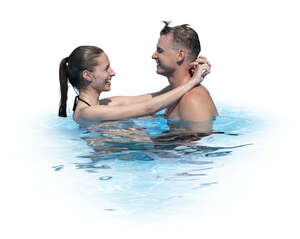 cut out couple in a pool having a great time