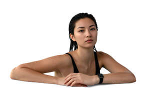 cut out asian woman leaning on a pool edge