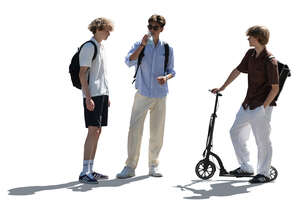 cut out group of backlit teenage boys standing and talking
