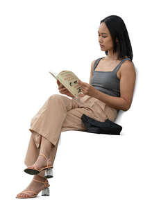 cut out woman reading a book