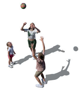 top view of three kids jumping and playing ball