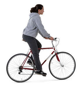 side view of a woman riding a bicycle