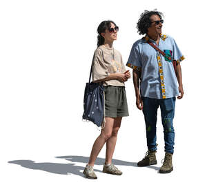 latino man and a woman standing and looking up