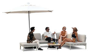 group of people sitting on a balcony sofa and talking