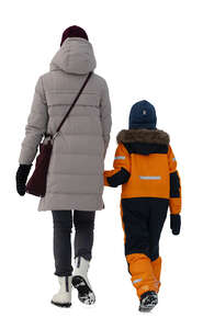 mother and son walking hand in hand in winter