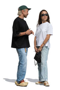 two asian people standing and talking