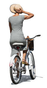 woman with a hat riding a bike